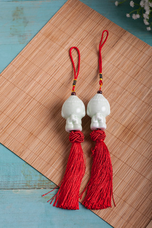Ceramic Buddha hanging ornamentの写真素材