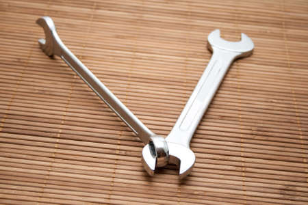 Double open end wrench with combination wrench on underlayment の写真素材