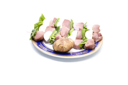 Shashlik on Spit with Potato for Cooking の写真素材