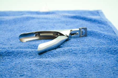 Cutter for Nails on Blue Towelの写真素材