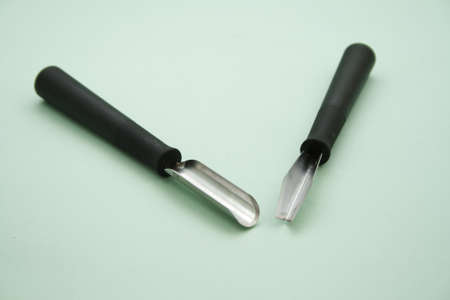 Carving tool on Green Backgroundの写真素材