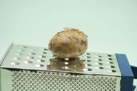 Brown Potato  on Grater の写真素材