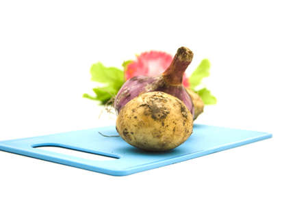 Potato with Onion on blue Underlayment の写真素材