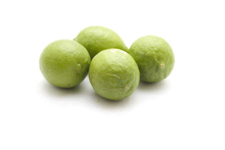 Green Lemon on white background の写真素材
