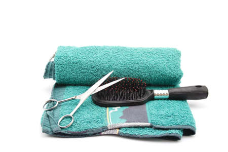 Haircomb with Scissors on Towel の写真素材