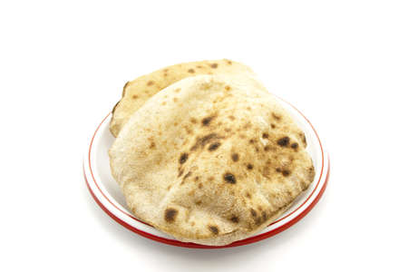 Baked Egypt Bread  on Plastic plateの写真素材