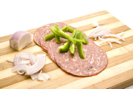 Sliced Bell Pepper and Onions with Salami の写真素材