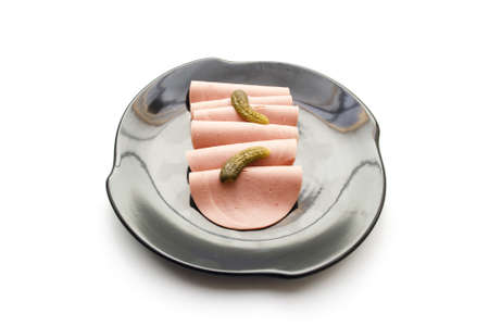 Beef Cold Cuts with Gherkins on Black Plate の写真素材