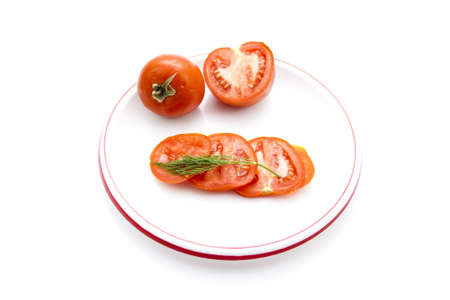 Fresh Tomatos on Plastic Plate の写真素材