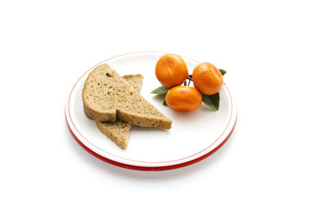 Plastic Tangerine  with Bread on Plastic Plate 