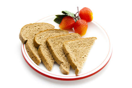 Plastic Strawberries  with Bread on Plastic Plate の写真素材
