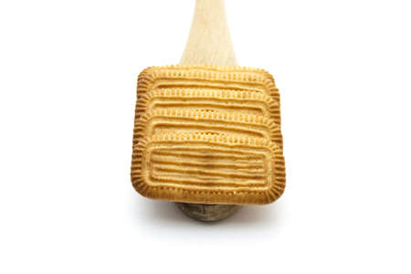 Baked Biscuits on wooden spoon の写真素材