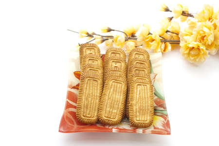 Biscuits in Glass Bowl on white background の写真素材