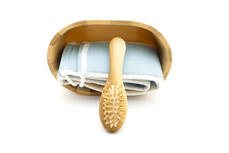 Wooden Hairbrush with Blue Cloth in wooden containerの写真素材