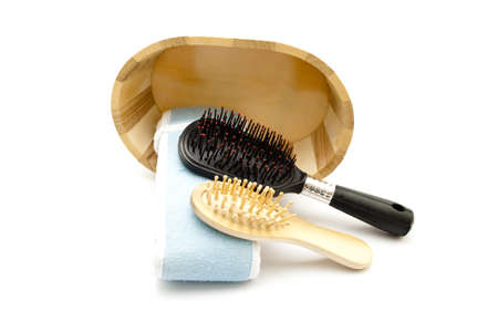 Hairbrush with Wooden Comb  and Blue Cloth の写真素材