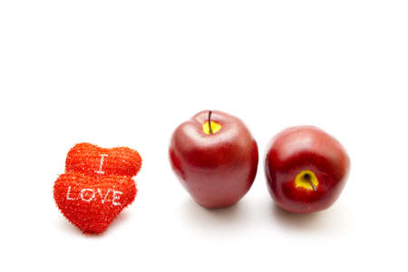 Plastic Apples with Red Heartsの写真素材