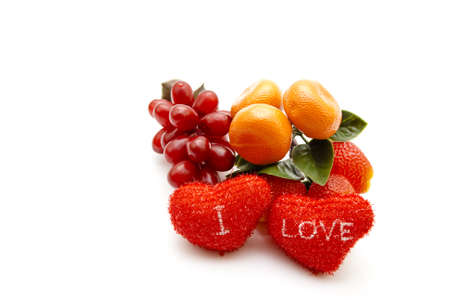 Plastic Fruits with Red Hearts の写真素材