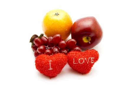 Plastic Fruits with Red Hearts の写真素材