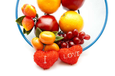 Plastic Fruits with Red Hearts の写真素材