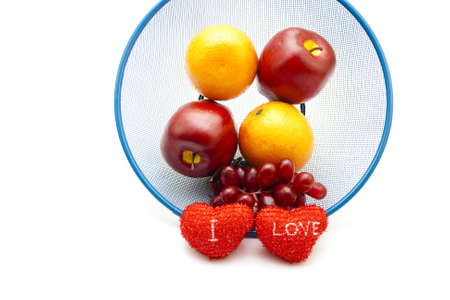 Plastic Fruits with Red Hearts の写真素材