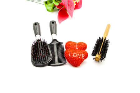 Different Hairbrush with Red Hearts の写真素材
