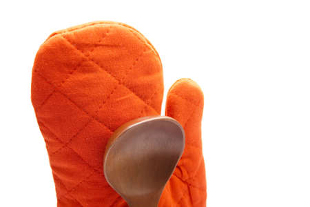 Red Potholder with Wooden soup spoon の写真素材