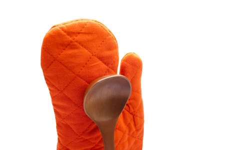 Red Potholder with Wooden soup spoon の写真素材