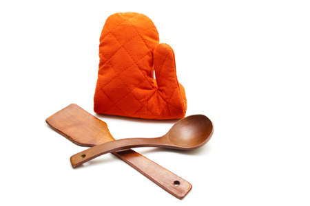 Red Potholder with Wooden Cooking spoon and soup spoon の写真素材