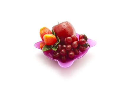 Plastic Fruits in glass bowl の写真素材