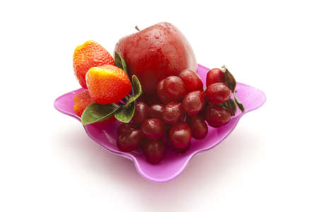 Plastic Fruits in glass bowl の写真素材