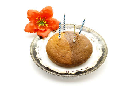 Marble Cake with Candles and red flowerの写真素材