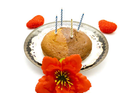 Marble Cake with Candles and red flowerの写真素材