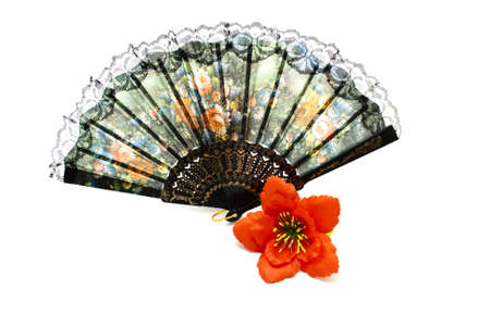 Black Hand Fan with red flower  on white backgroundの写真素材