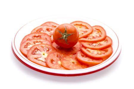 Red Tomato Slices on Plate の写真素材