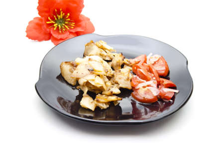 Roast Potatoes with Tomato Salad の写真素材