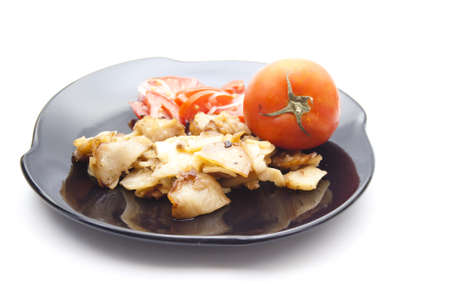 Roast Potatoes with Tomato Salad の写真素材
