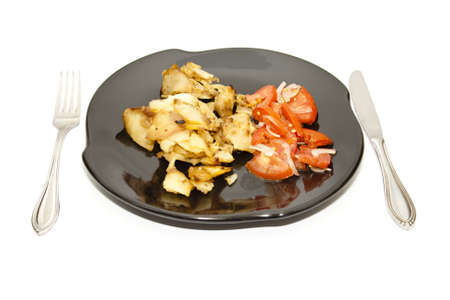 Roast Potatoes with Tomato Salad の写真素材