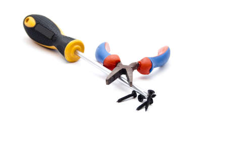  Screwdriver with black wooden screws and Tongの写真素材