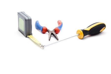 Measuring Tape with Screwdriver and Tong の写真素材
