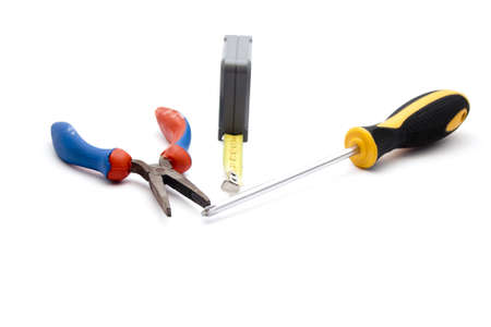 Measuring Tape with Screwdriver and Tongの写真素材