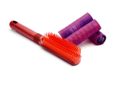 Red hair Curler with hairbrush の写真素材