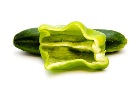 Fresh Green Cucumber with Capsicum  on white background の写真素材