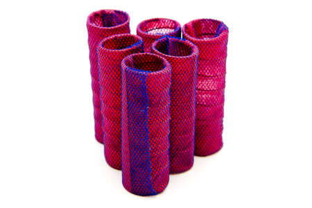 Red Haircurler on white background の写真素材