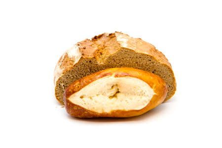 Fresh baked Brown Bread with lye Bread Roll on white backgroundの写真素材