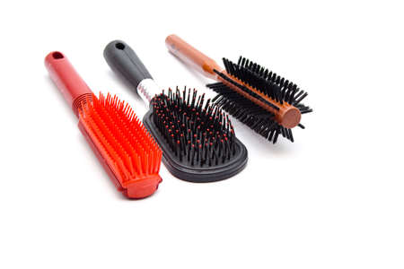 Different hairbrush on white background