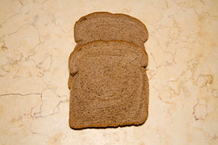Fresh Baked Brown Bread on marble Top 