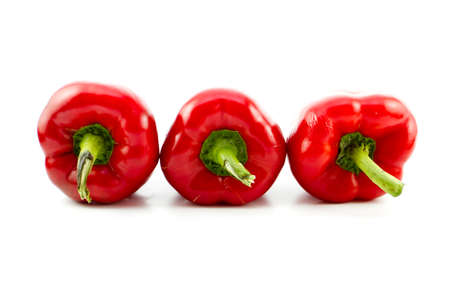 Fresh Red Capsicum on white background の写真素材