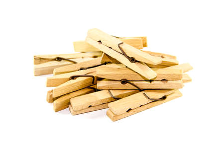 Wooden Clothespins on white background