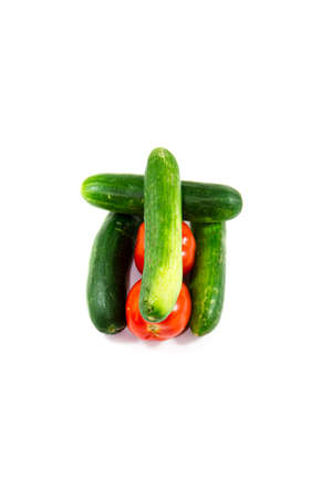 Fresh Green Cucumber with Red Tomatoesの写真素材