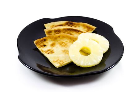 Fresh pancakes with pineapple on white backgroundの写真素材
